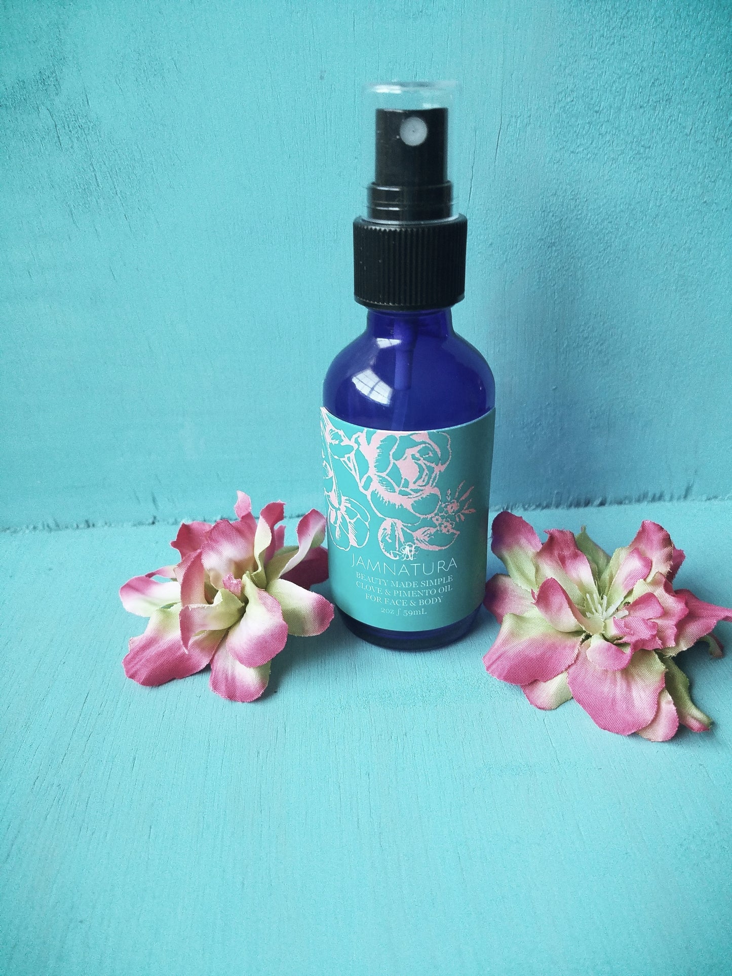 Best 2 oz Clove and Pimento Serum For Face, Body & Hair.